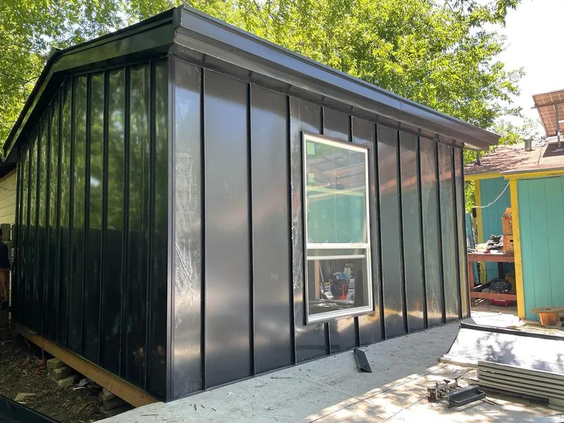 Black standing seam metal wall panels for Metal Roof Installation in Gainesville